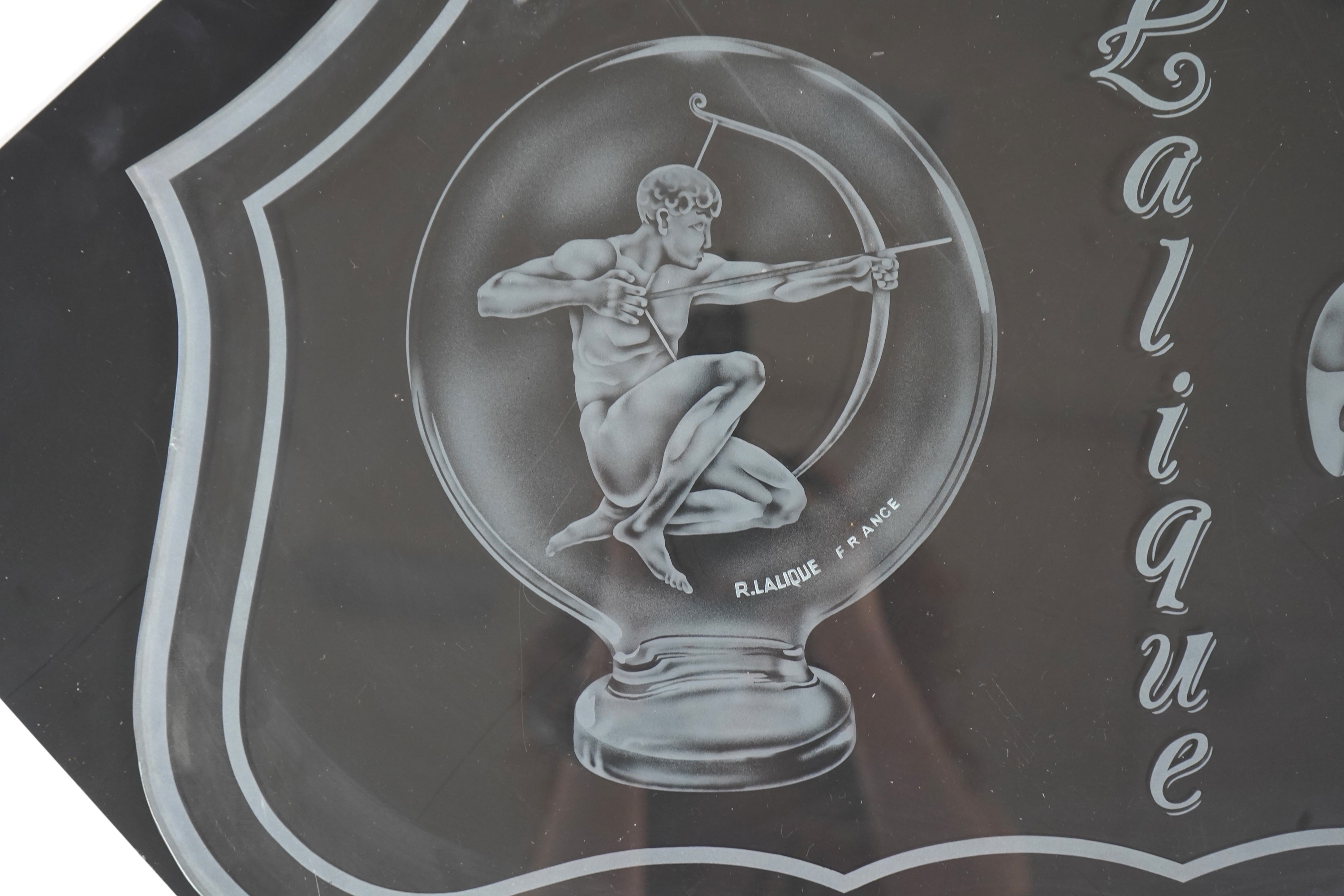 A rare boutique advertising hanging glass sign for Lalique